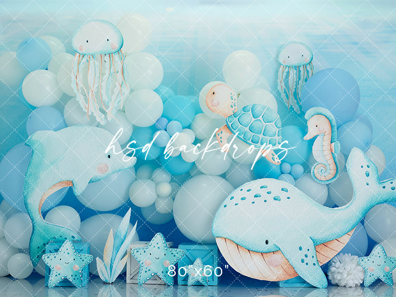 Under the Baby Blue Sea cake smash birthday party backdrop 